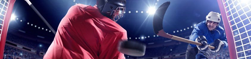 Hockey player scoring.